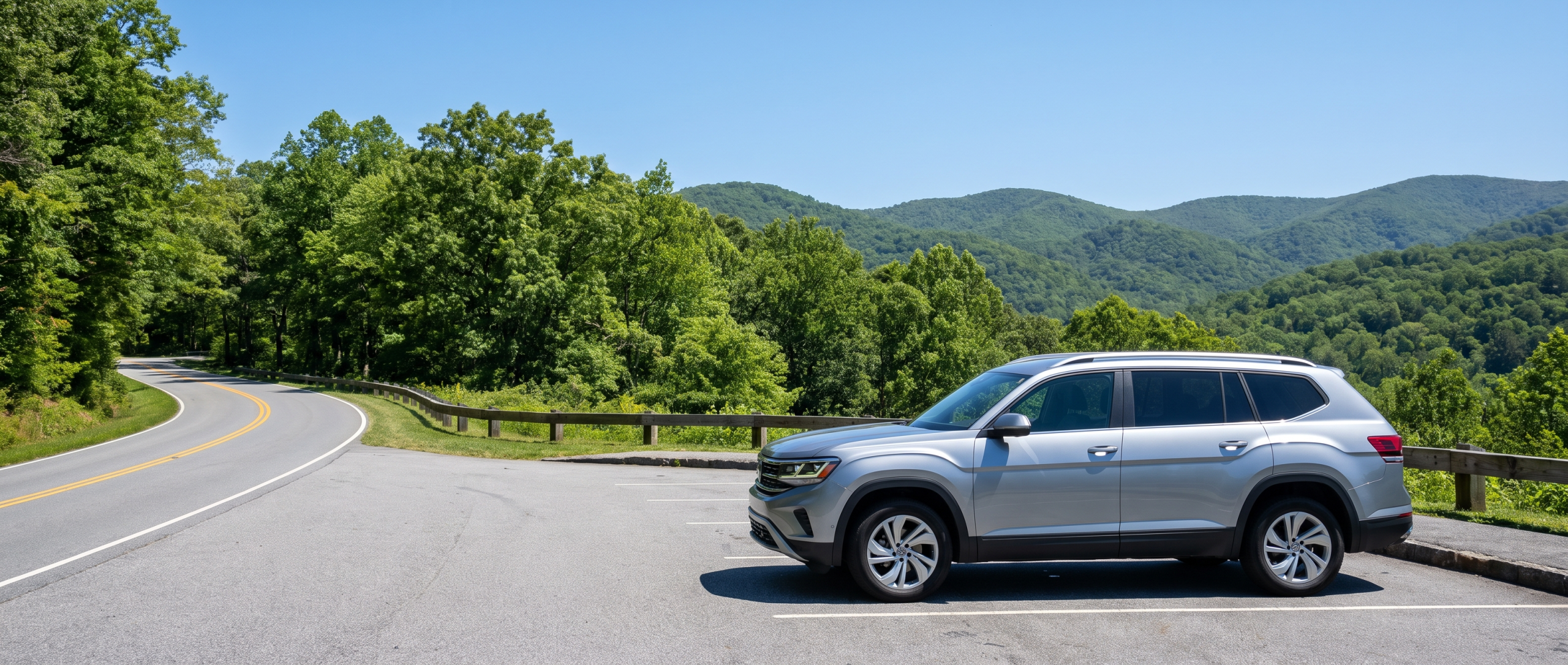 2026 Volkswagen Atlas at a scenic overlook on the Cherokee Foothills Scenic Highway in Upstate South Carolina on a summer day