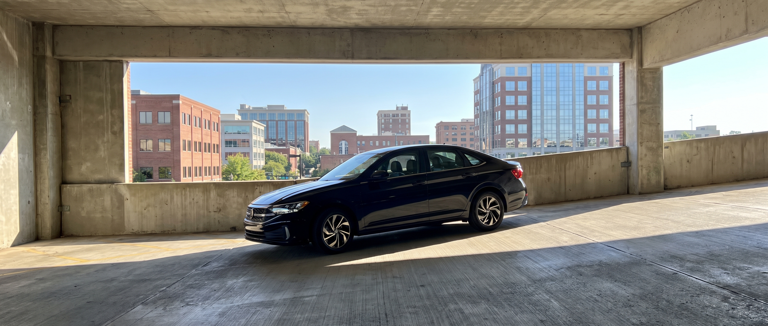 2026 Volkswagen Jetta entering a downtown Spartanburg SC parking garage