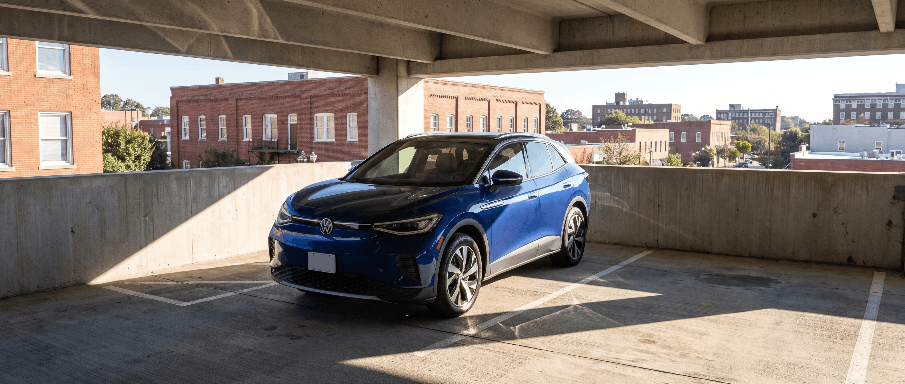 2026 Volkswagen ID.4 charging at a downtown Spartanburg municipal parking garage