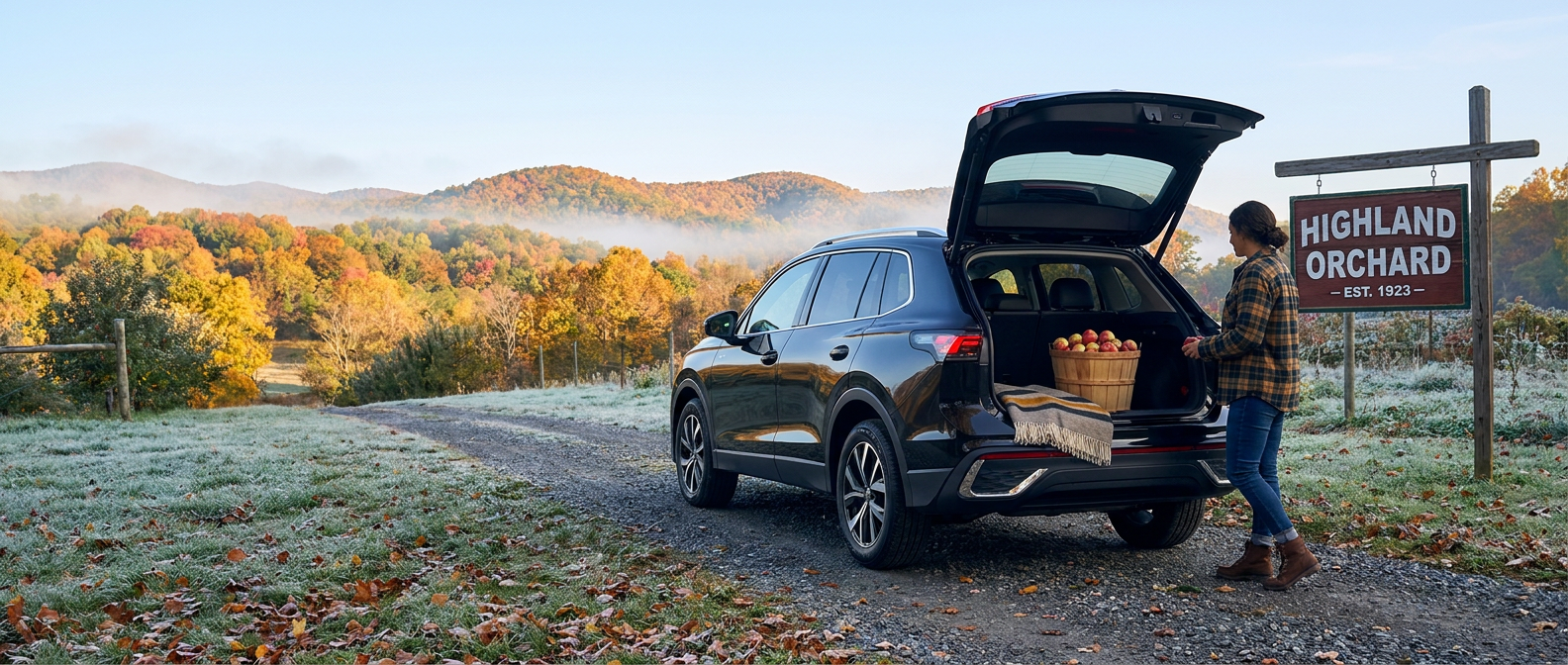 2026 Volkswagen Tiguan with open hatch at a Hendersonville, NC apple orchard on a fall morning